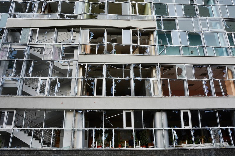KYIV, UKRAINE - 2023/01/01: View of a destroyed residential building after a missile attack by Russia in Kyiv. Rocket attacks by Russia on December 31, 2022 in Kyiv, Ukraine. In many districts of Kyiv, a number of buildings were seriously damaged, 2 people died, and about 50 were injured. (Photo by Aleksandr Gusev/SOPA Images/LightRocket via Getty Images)