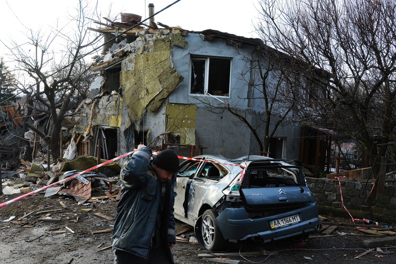 KYIV, UKRAINE - 2023/01/01: View of a destroyed residential building after a missile attack by Russia in Kyiv. Rocket attacks by Russia on December 31, 2022 in Kyiv, Ukraine. In many districts of Kyiv, a number of buildings were seriously damaged, 2 people died, and about 50 were injured. (Photo by Aleksandr Gusev/SOPA Images/LightRocket via Getty Images)
