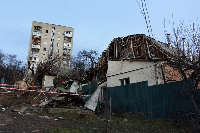 KYIV, UKRAINE - 2023/01/01: View of a destroyed residential building after a missile attack by Russia in Kyiv. Rocket attacks by Russia on December 31, 2022 in Kyiv, Ukraine. In many districts of Kyiv, a number of buildings were seriously damaged, 2 people died, and about 50 were injured. (Photo by Aleksandr Gusev/SOPA Images/LightRocket via Getty Images)