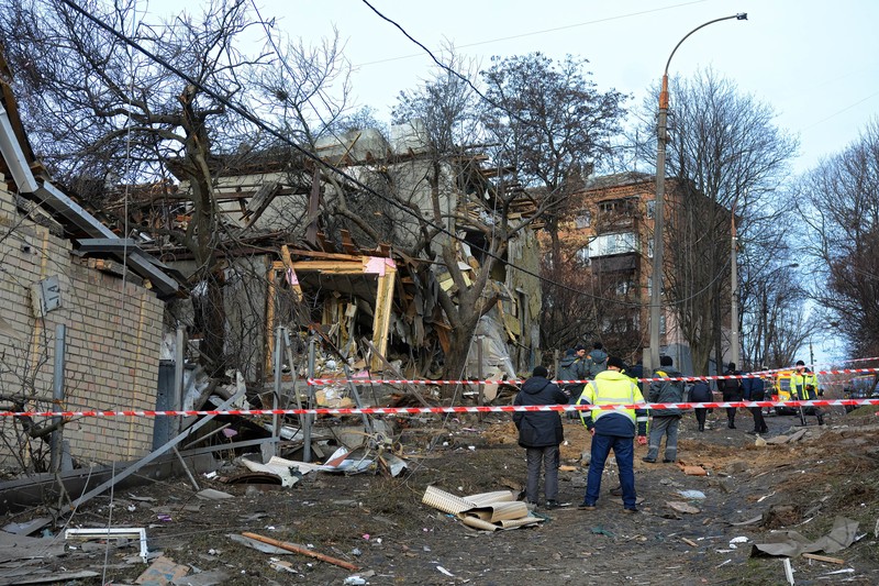 KYIV, UKRAINE - 2023/01/01: View of a destroyed residential building after a missile attack by Russia in Kyiv. Rocket attacks by Russia on December 31, 2022 in Kyiv, Ukraine. In many districts of Kyiv, a number of buildings were seriously damaged, 2 people died, and about 50 were injured. (Photo by Aleksandr Gusev/SOPA Images/LightRocket via Getty Images)
