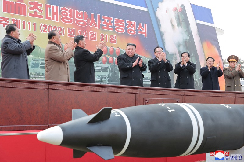 NORTHKOREA-POLITICS/ North Korean leader Kim Jong Un attends a ceremony where the new super-large multiple rocker launchers were presented before a plenary meeting of the ruling Workers' Party of Korea in Pyongyang, North Korea, in this photo released on January 1, 2023 by North Korea's Korean Central News Agency (KCNA). KCNA via REUTERS ATTENTION EDITORS - THIS IMAGE WAS PROVIDED BY A THIRD PARTY. REUTERS IS UNABLE TO INDEPENDENTLY VERIFY THIS IMAGE. NO THIRD PARTY SALES. SOUTH KOREA OUT. NO COMMERCIAL OR EDITORIAL SALES IN SOUTH KOREA.