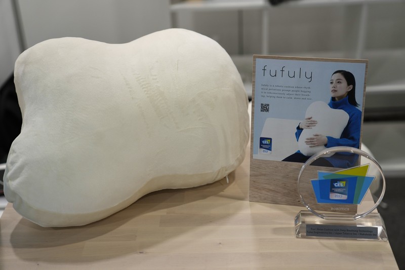 The Anura Lite is demonstrated at the Nuralogix booth during CES Unveiled ahead of the CES tech show, Tuesday, Jan. 3, 2023, in Las Vegas. The application uses a 30-second video selfie to capture facial blood flow patterns, which are used to output medical-grade health and vital sign measurements. (AP Photo/Rick Bowmer)