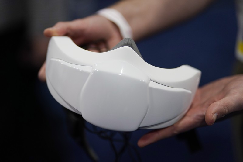 The Anura Lite is demonstrated at the Nuralogix booth during CES Unveiled ahead of the CES tech show, Tuesday, Jan. 3, 2023, in Las Vegas. The application uses a 30-second video selfie to capture facial blood flow patterns, which are used to output medical-grade health and vital sign measurements. (AP Photo/Rick Bowmer)