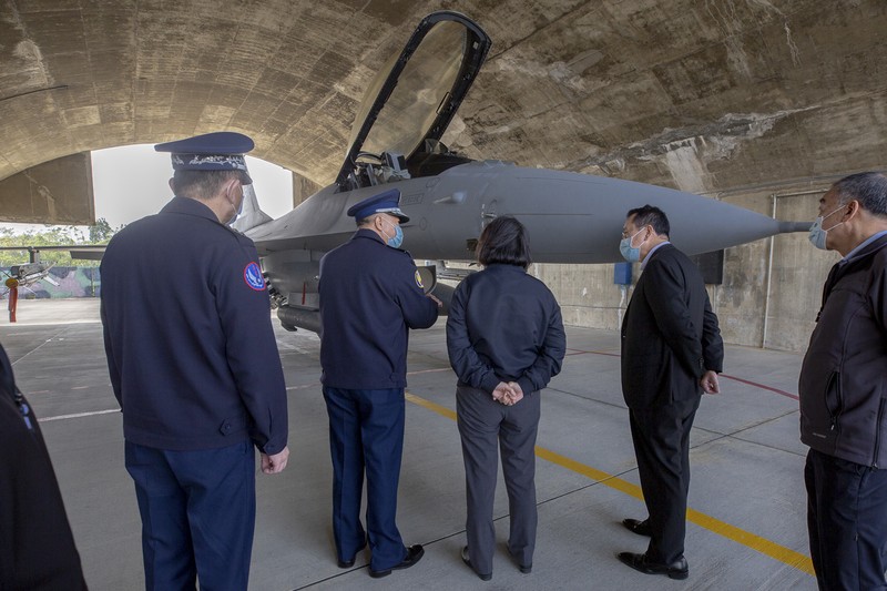 In this photo released by the Taiwan Presidential Office, soldiers take part in a drill during a visit by Taiwan's President Tsai Ing-wen, at a military base in Chiayi in southwestern Taiwan, Friday, Jan. 6, 2023. President Tsai visited a military base Friday to observe drills while rival China protested the passage of a U.S. Navy destroyer through the Taiwan Strait, as tensions between the sides showed no sign of abating in the new year. (Taiwan Presidential Office via AP)