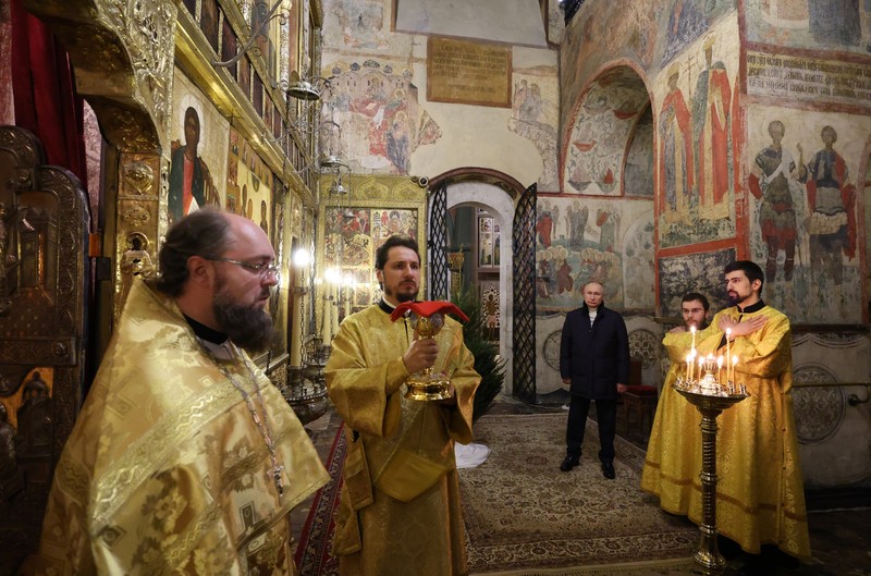Russia Putin Orthodox Christians Russian President Vladimir Putin, background center, attends the Christmas service at the Annunciation Cathedral in the Moscow Kremlin in Moscow, Russia, Saturday, Jan. 7, 2023. Orthodox Christians celebrate Christmas on Jan. 7, in accordance with the Julian calendar. (Mikhail Klimentyev, Sputnik, Kremlin Pool Photo via AP)