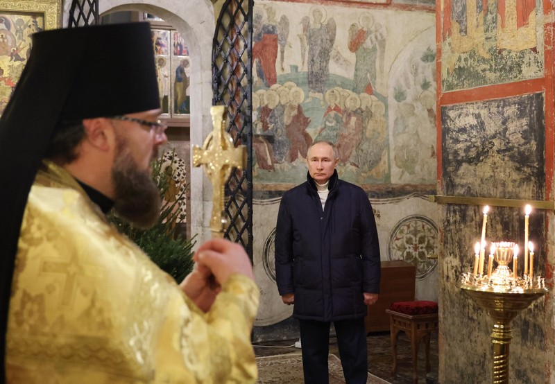 Russia Putin Orthodox Christians Russian President Vladimir Putin, background center, attends the Christmas service at the Annunciation Cathedral in the Moscow Kremlin in Moscow, Russia, Saturday, Jan. 7, 2023. Orthodox Christians celebrate Christmas on Jan. 7, in accordance with the Julian calendar. (Mikhail Klimentyev, Sputnik, Kremlin Pool Photo via AP)