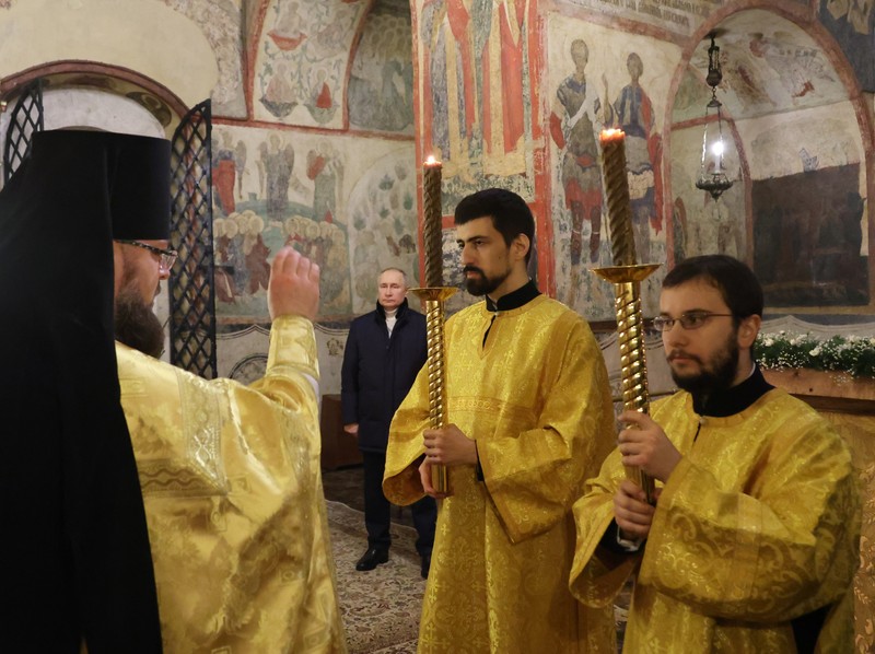 Russia Putin Orthodox Christians Russian President Vladimir Putin, background center, attends the Christmas service at the Annunciation Cathedral in the Moscow Kremlin in Moscow, Russia, Saturday, Jan. 7, 2023. Orthodox Christians celebrate Christmas on Jan. 7, in accordance with the Julian calendar. (Mikhail Klimentyev, Sputnik, Kremlin Pool Photo via AP)