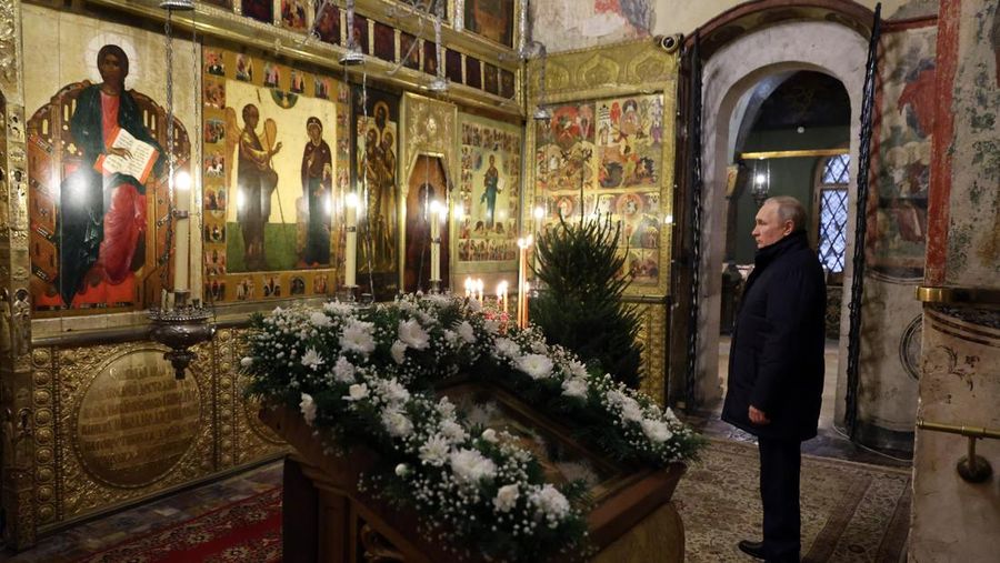 Russian President Vladimir Putin, background center, attends the Christmas service at the Annunciation Cathedral in the Moscow Kremlin in Moscow, Russia, Saturday, Jan. 7, 2023. Orthodox Christians celebrate Christmas on Jan. 7, in accordance with the Julian calendar. (Mikhail Klimentyev, Sputnik, Kremlin Pool Photo via AP)