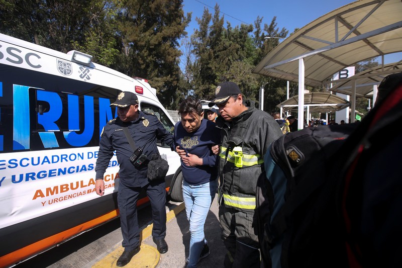 MEXICO-ACCIDENT/METRO Rescue personnel work near the area where two subway trains collide head-on at a subway station, in Mexico City, Mexico, January 7, 2023. REUTERS/Quetzalli Nicte-Ha