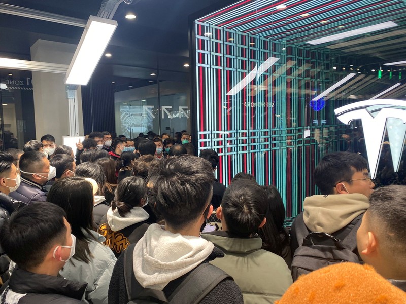 People protest at a Tesla showroom in Chengdu, Sichuan, China, released January 6, 2023 in this picture obtained by Reuters from social media. THIS IMAGE HAS BEEN SUPPLIED BY A THIRD PARTY. NO RESALES. NO ARCHIVES.