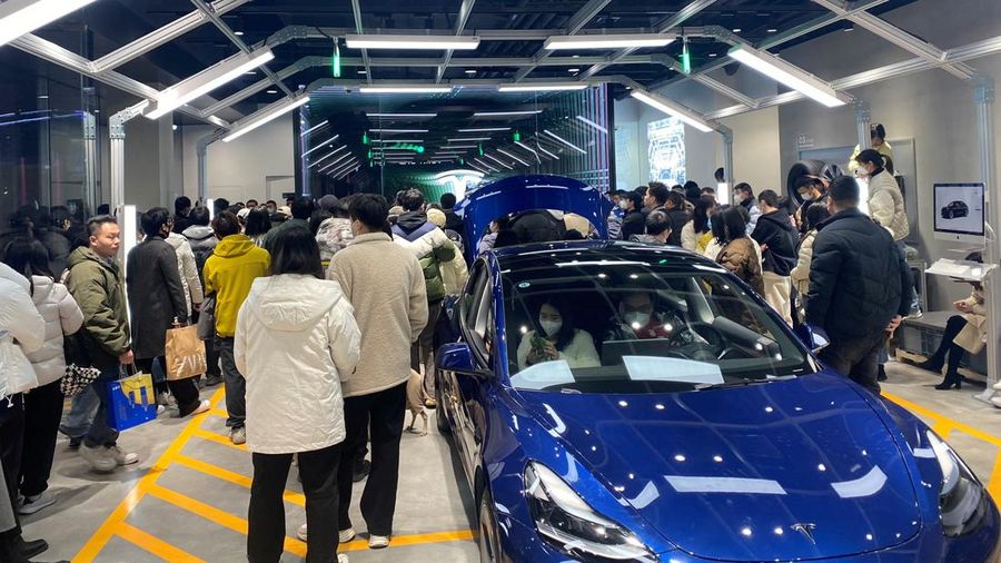 People protest at a Tesla showroom in Chengdu, Sichuan, China, released January 6, 2023 in this picture obtained by Reuters from social media. THIS IMAGE HAS BEEN SUPPLIED BY A THIRD PARTY. NO RESALES. NO ARCHIVES.