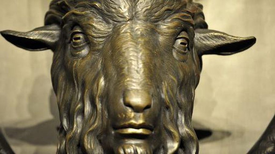 The Baphomet statue is seen in the conversion room at the Satanic Temple where a 
