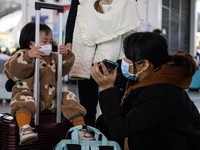 China Rasa Gambir! Warga Berebut Pulang Kampung Naik Kereta