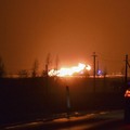 Kobaran api terlihat di pipa gas di wilayah Pasvalys di Lithuania utara, dekat perbatasan Latvia. (AP/Paulius Zidonis)
