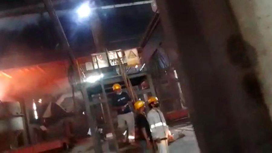 Employees react amid the chaos as Chinese and Indonesian workers clash at a nickel smelter in Morowali, Sulawesi, Indonesia in this undated social media video released January 16, 2023. Revi Limbong via REUTERS THIS IMAGE HAS BEEN SUPPLIED BY A THIRD PARTY. MANDATORY CREDIT