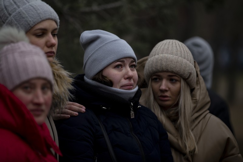 1456795838 DNIPRO, UKRAINE - JANUARY 15: Rescuers search people trapped under the rubble of a high-rise residential building hit by a missile on January 15, 2023 in Dnipro, Ukraine. On January 14, Russia launched a new massive attack on Ukrainian cities. In Dnipro, one of the Х-22 cruise missiles hit a nine-story residential building, completely destroying one of the sections from top to bottom floors. The number of dead has increased to 29 people, with rescue work continuing. More than 40 residents of the building are still being searched. (Photo by Yurii Stefanyak/Global Images Ukraine via Getty Images)