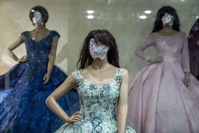 Afghanistan Mannequins Photo Gallery A mannequin's head is covered in a woman dress shop in Kabul, Afghanistan, Monday, Dec. 26, 2022. Under the Taliban, the mannequins in women's dress shops across the Afghan capital Kabul are a haunting sight, their heads cloaked in cloth sacks or wrapped in black plastic bags. The hooded mannequins are one symbol of the Taliban's puritanical rule over Afghanistan (AP Photo/Ebrahim Noroozi)