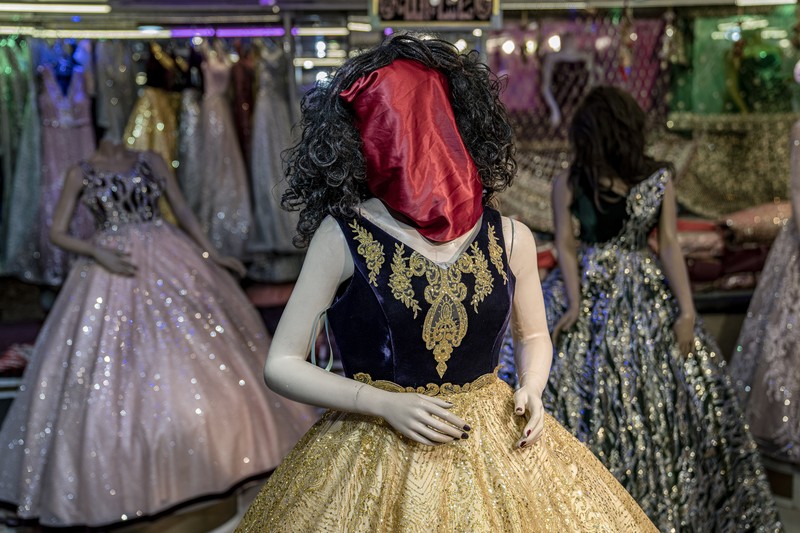 Afghanistan Mannequins Photo Gallery A mannequin's head is covered in a woman dress shop in Kabul, Afghanistan, Monday, Dec. 26, 2022. Under the Taliban, the mannequins in women's dress shops across the Afghan capital Kabul are a haunting sight, their heads cloaked in cloth sacks or wrapped in black plastic bags. The hooded mannequins are one symbol of the Taliban's puritanical rule over Afghanistan (AP Photo/Ebrahim Noroozi)