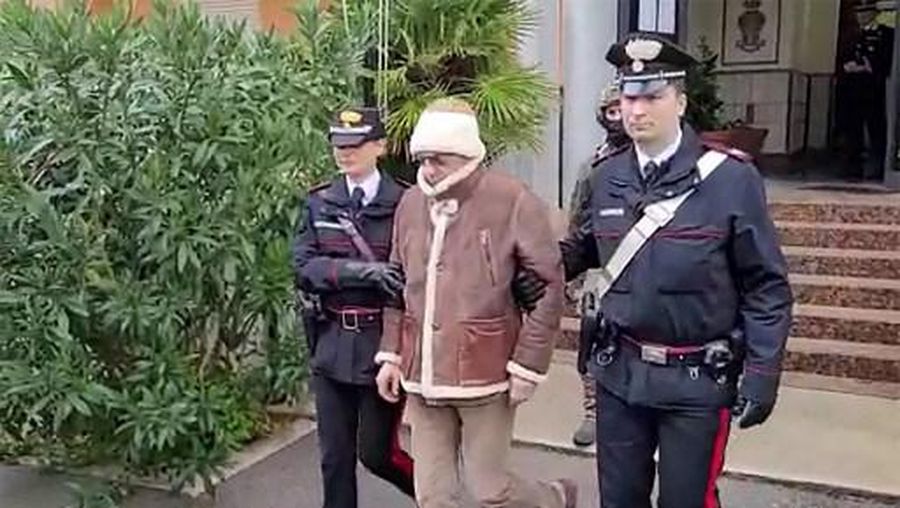 This handout video grab taken and released by the Italian Carabinieri Press Office on January 16, 2023 shows the arrest by Carabinieri of the Italy's top wanted mafia boss, Matteo Messina Denaro in Palermo, in his native Sicily after 30 years on the run. - Italian anti-mafia police caught Sicilian godfather Matteo Messina Denaro on January 16, 2023, ending a 30-year manhunt for Italy's most wanted fugitive. The mobster was nabbed