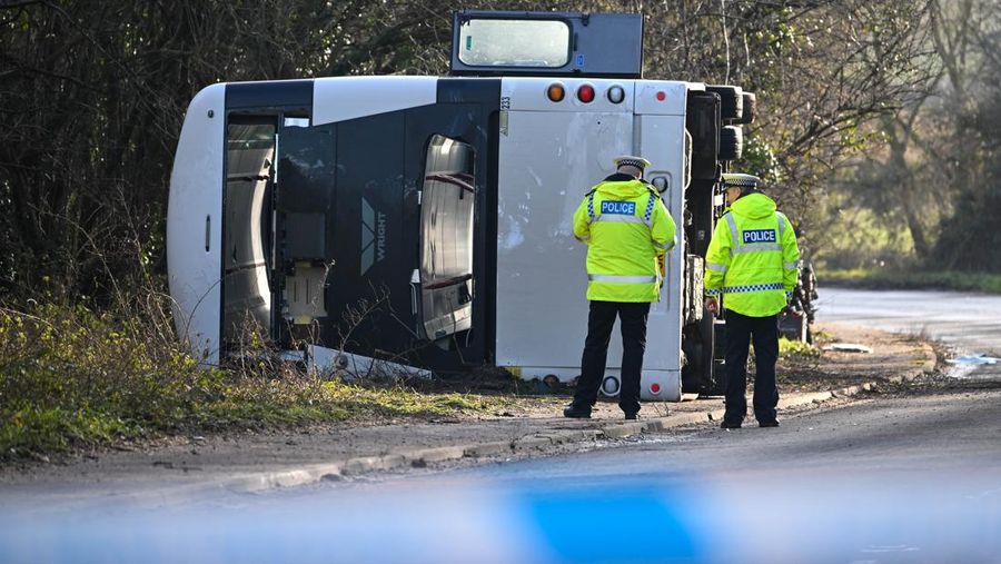 CANNINGTON, SOMERSET - JANUARY 17: An aerial view of police at the scene after the early-morning crash on January 17, 2023 near Cannington, Somerset, England. The bus was carrying workers at Hinkley Point C, the nuclear power station about 8 miles from the scene of the crash. (Photo by Finnbarr Webster/Getty Images)