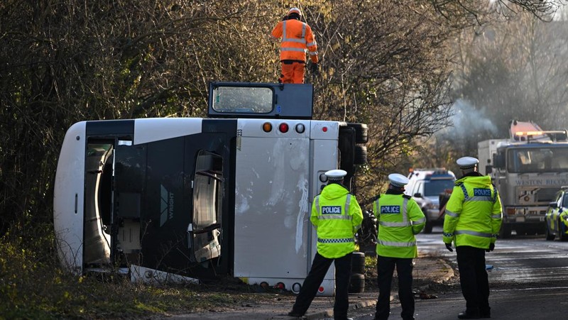 CANNINGTON, SOMERSET - JANUARY 17: An aerial view of police at the scene after the early-morning crash on January 17, 2023 near Cannington, Somerset, England. The bus was carrying workers at Hinkley Point C, the nuclear power station about 8 miles from the scene of the crash. (Photo by Finnbarr Webster/Getty Images)