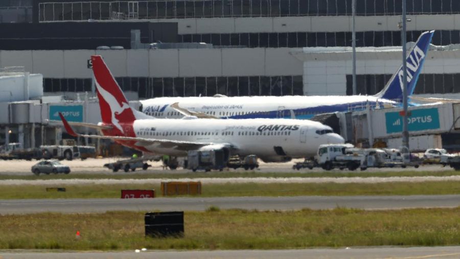 SYDNEY, AUSTRALIA - JANUARY 18: Qantas flight QF144 berths at a gate at Sydney Airport on January 18, 2023 in Sydney, Australia. Emergency services were on standby at Sydney Airport after Qantas flight QF144 from Auckland issued a mayday call on Wednesday afternoon. (Photo by Brendon Thorne/Getty Images)
