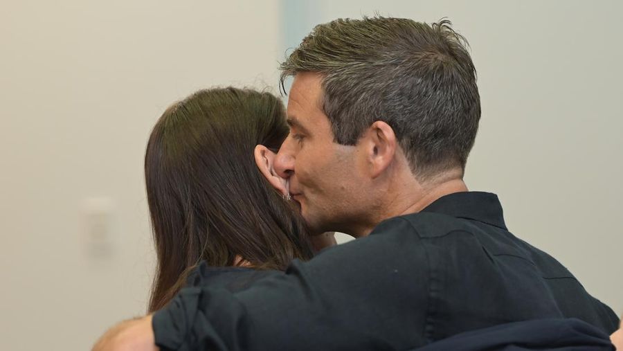 NAPIER, NEW ZEALAND - JANUARY 19: Clarke Gayford looks on as Prime Minister Jacinda Ardern announces her resignation at the War Memorial Centre on January 19, 2023 in Napier, New Zealand. (Photo by Kerry Marshall/Getty Images)