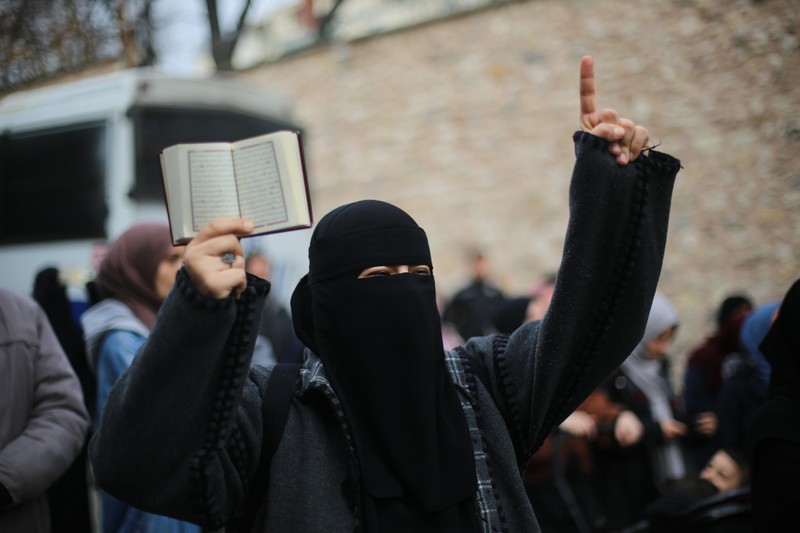 ISTANBUL, TURKIYE- JANUARY 22: The burning of the Qur'an in Sweden was Protested in Istanbul on January 22, 2023 in Istanbul, Türkiye. A group protesting the burning of the Quran in front of the Turkish Embassy in Stockholm by Rasmus Paludan, the leader of the Danish far-right Stram Kurs party, held a protest in front of the Swedish Consulate in Istanbul. (Photo by Hakan Akgun/ dia images via Getty Images)