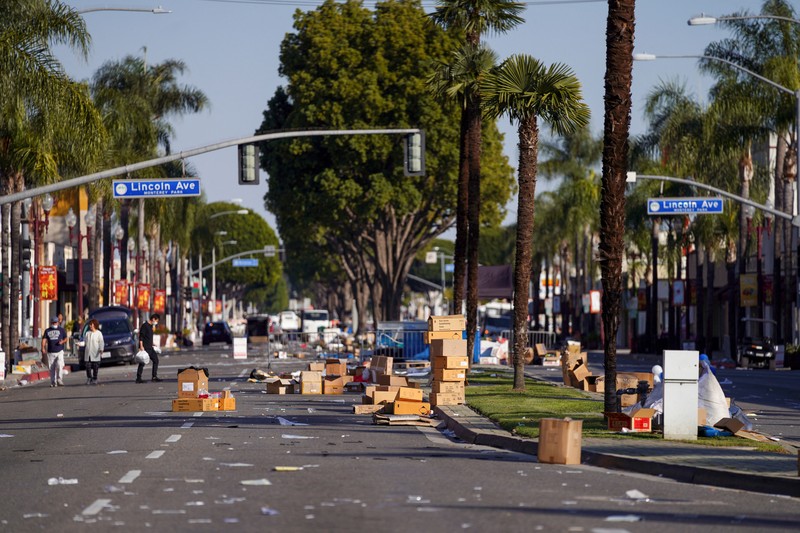 CALIFORNIA-SHOOTING/ Boxes and trash are left as a Chinese Lunar New Year celebration is taken down near the scene of a shooting that took place during a Chinese Lunar New Year celebration, in Monterey Park, California, U.S. January 22, 2023. REUTERS/Allison Dinner