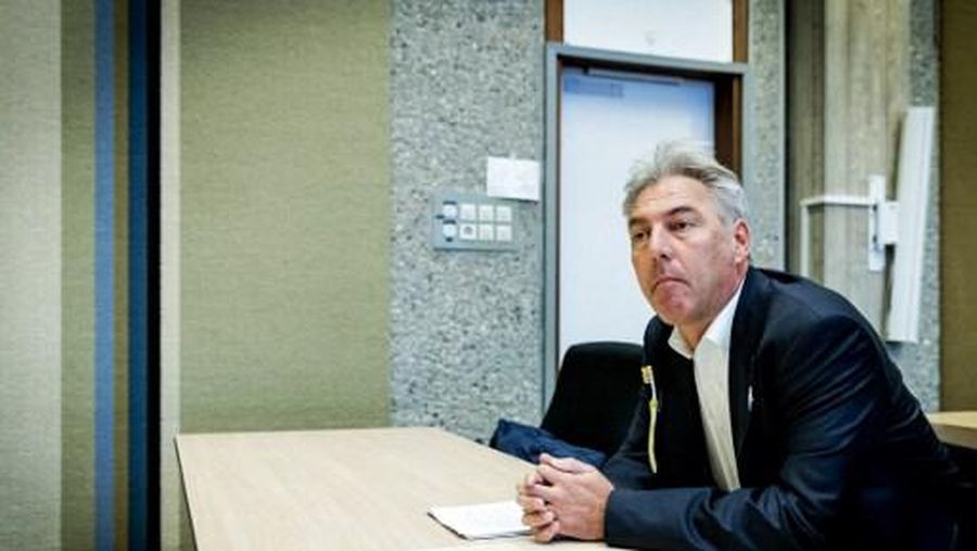 Edwin Wagensveld (R), Dutch leader of the anti-migrant and Islamophobic movement PEGIDA (Patriotic Europeans Against the Islamisation of the West), looks on prior to his trial at the cantonal court in Amsterdam, on November 24. 2016. - Wagensveld had to appear before the cantonal court because he showed a banner during a demonstration with a swastika symbol on it. (Photo by Robin van Lonkhuijsen / ANP / AFP) / Netherlands OUT