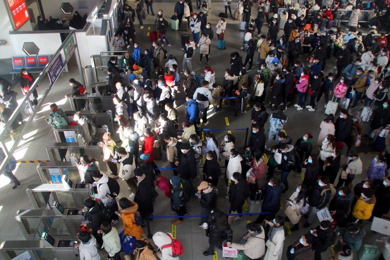 QINGZHOU, CHINA - JANUARY 27, 2023 - Many passengers wait at the waiting hall of Suzhou Railway Station in East China's Jiangsu province, Jan 27, 2023. According to the data center of the Ministry of Culture and Tourism, 308 million domestic trips were made during the Spring Festival holiday this year, up 23.1% year on year, recovering to 88.6% in the same period of 2019. Domestic tourism revenue reached 375.843 billion yuan, up 30% year on year, recovering to 73.1% in the same period of 2019. (Photo credit should read CFOTO/Future Publishing via Getty Images)