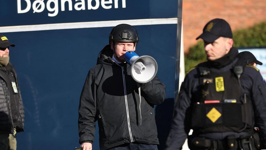 Far-right politician Rasmus Paludan burns a copy of Kuran in front of a mosque at Noerrebro, in Copenhagen, Denmark, Friday January 27, 2023. Ritzau Scanpix/Olafur Steinar Gestsson via REUTERS    ATTENTION EDITORS - THIS IMAGE WAS PROVIDED BY A THIRD PARTY. DENMARK OUT. NO COMMERCIAL OR EDITORIAL SALES IN DENMARK.
