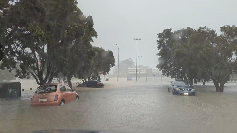 Stranded vehicles are seen during heavy rainfall in Auckland, New Zealand January 27, 2023, in this screen grab obtained from a social media video. @MonteChristoNZ/via REUTERS THIS IMAGE HAS BEEN SUPPLIED BY A THIRD PARTY. MANDATORY CREDIT. NO RESALES. NO ARCHIVES.