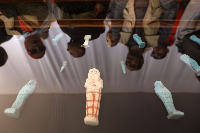 1459632878 CAIRO, EGYPT- JANUARY 26: Egyptian archaeological workers excavating the site of the Step Pyramid of Djoser in Saqqara during the announcement of new discoveries at the Director Bridge in Saqqara, on January 26, 2023 in Giza, Egypt. (Photo by Fadel Dawod/Getty Images)