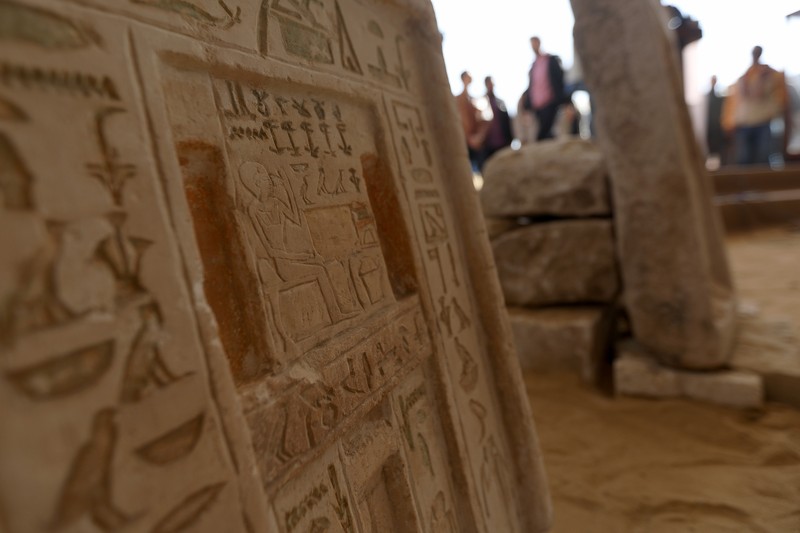 1459632878 CAIRO, EGYPT- JANUARY 26: Egyptian archaeological workers excavating the site of the Step Pyramid of Djoser in Saqqara during the announcement of new discoveries at the Director Bridge in Saqqara, on January 26, 2023 in Giza, Egypt. (Photo by Fadel Dawod/Getty Images)