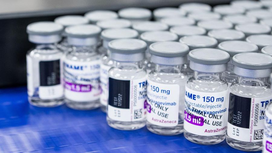 Vials of a test production are pictured at the assembly line of the manufacturing facility of pharmaceutical company AstraZeneca for biological medicines in Södertälje, south of Stockholm, Sweden on February 8, 2022. - AstraZenecas new facility in Sweden located in Södertälje was inaugurated last December and is dedicated to the production of next generation biological drugs such as Evusheld, a Covid-19 preventative monoclonal antibody treatment for immunocompromised people. (Photo by Jonathan NACKSTRAND / AFP) (Photo by JONATHAN NACKSTRAND/AFP via Getty Images)