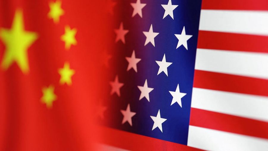 U.S. and Chinese flags are seen in this illustration taken, January 30, 2023. REUTERS/Dado Ruvic/Illustration