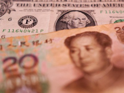 U.S. Dollar and Chinese Yuan banknotes are seen in this illustration taken January 30, 2023. REUTERS/Dado Ruvic/Illustration