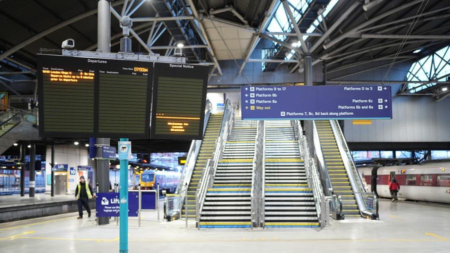 A commuter passes a closed entrance to London Victoria railway station during joint strike action by train drivers, teachers, university staff and civil servants, in London, UK, on Wednesday, Feb. 1, 2023. The day of coordinated industrial action is expected to be Britains most severe day of strikes for over a decade, piling pressure on Prime Minister Rishi Sunaks Conservative administration to resolve disputes with public sector workers by making more generous offers on pay. Photographer: Chris Ratcliffe/Bloomberg via Getty Images