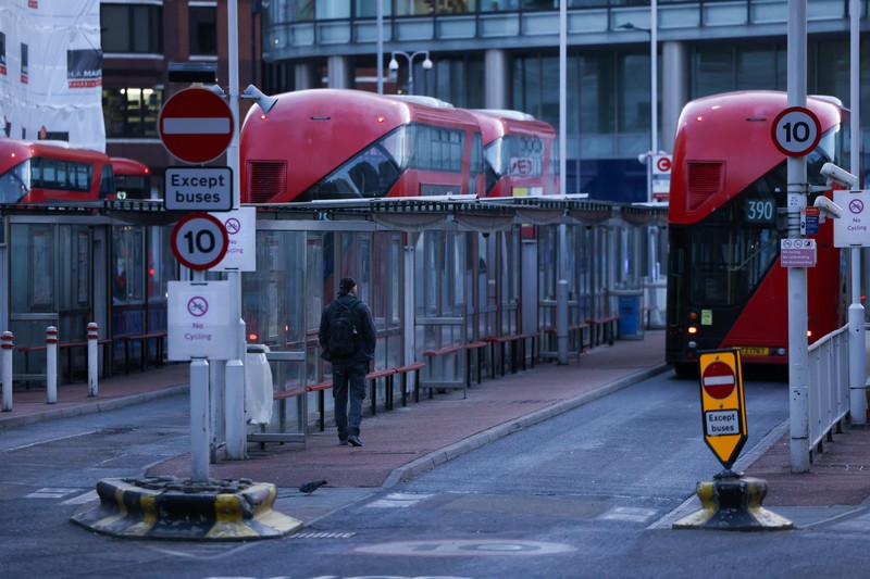 A commuter passes a closed entrance to London Victoria railway station during joint strike action by train drivers, teachers, university staff and civil servants, in London, UK, on Wednesday, Feb. 1, 2023. The day of coordinated industrial action is expected to be Britains most severe day of strikes for over a decade, piling pressure on Prime Minister Rishi Sunaks Conservative administration to resolve disputes with public sector workers by making more generous offers on pay. Photographer: Chris Ratcliffe/Bloomberg via Getty Images