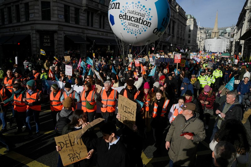 Striking workers attend a march, in London, Britain February 1, 2023. REUTERS/Toby Melville
