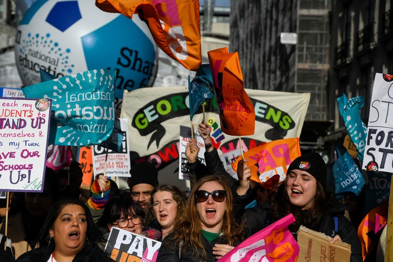 Striking workers attend a march, in London, Britain February 1, 2023. REUTERS/Toby Melville