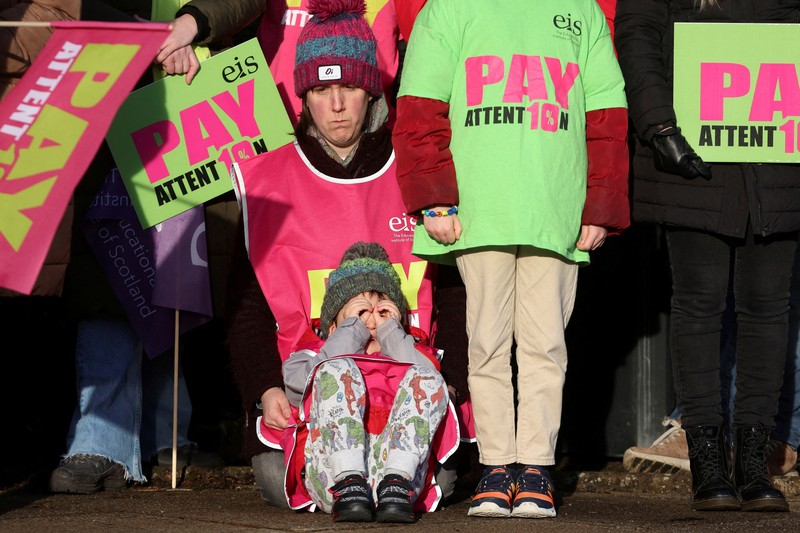 Striking workers attend a march, in London, Britain February 1, 2023. REUTERS/Toby Melville