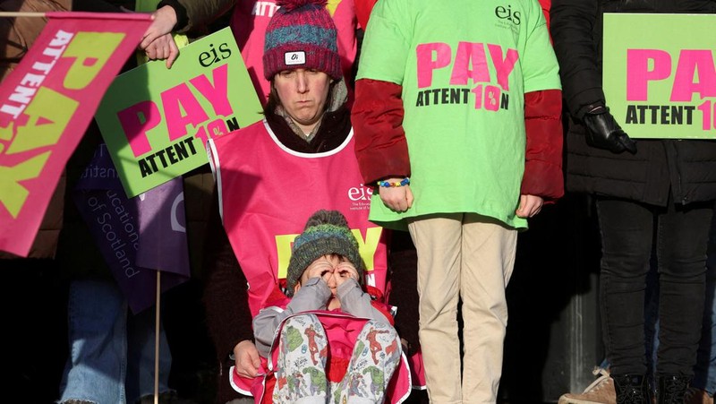 Striking workers attend a march, in London, Britain February 1, 2023. REUTERS/Toby Melville