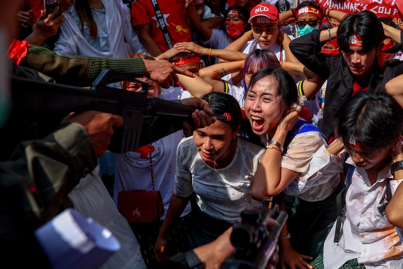 Protesters perform during a demonstration to mark the second anniversary of Myanmar's 2021 military coup, outside the Embassy of Myanmar in Bangkok, Thailand, February 1, 2023. REUTERS/Athit Perawongmetha