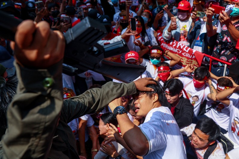 Protesters perform during a demonstration to mark the second anniversary of Myanmar's 2021 military coup, outside the Embassy of Myanmar in Bangkok, Thailand, February 1, 2023. REUTERS/Athit Perawongmetha