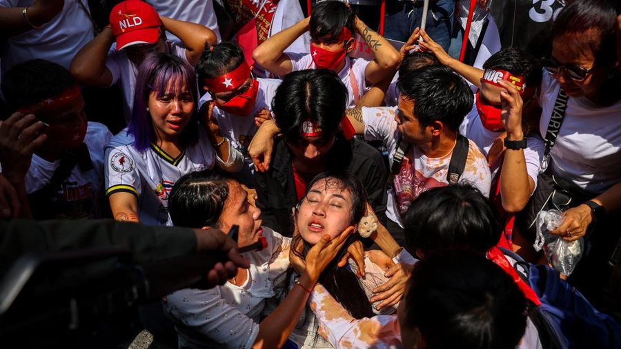 Protesters perform during a demonstration to mark the second anniversary of Myanmar's 2021 military coup, outside the Embassy of Myanmar in Bangkok, Thailand, February 1, 2023. REUTERS/Athit Perawongmetha