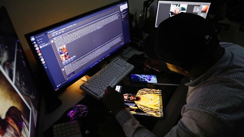 Nigerian artist Malik Afegbua creates hyper-realistic pictures of African elderly people, using artificial intelligence, at his home in Lagos, Nigeria January 25, 2023. REUTERS/Temilade Adelaja