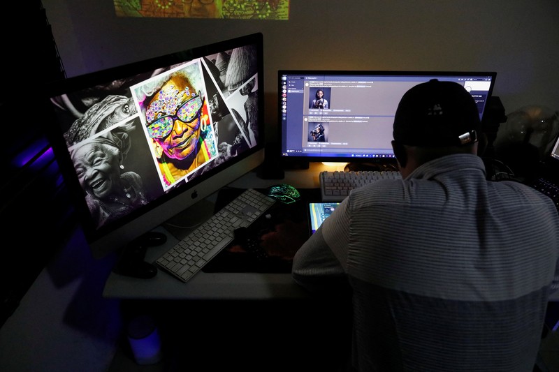 Nigerian artist Malik Afegbua creates hyper-realistic pictures of African elderly people, using artificial intelligence, at his home in Lagos, Nigeria January 25, 2023. REUTERS/Temilade Adelaja