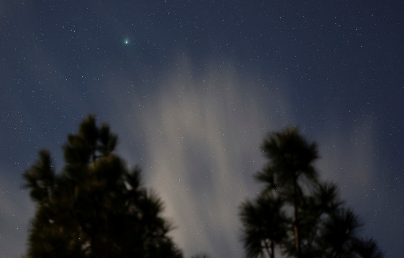 A green comet named Comet C/2022 E3 (ZTF), which last passed by our planet about 50,000 years ago, is seen from the Pico de las Nieves, in the island of Gran Canaria, Spain, February 1, 2023. REUTERS/Borja Suarez      TPX IMAGES OF THE DAY